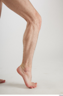 Tony  1 calf flexing nude side view 0005.jpg